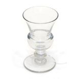 A Wine Glass, early 19th century, the thistle shaped bowl on a blade knop stem and circular foot,