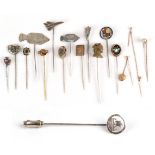 Seventeen Stick Pins, including a pearl that converts from a pin to a stud, cased; a pietra dura