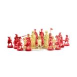 An Indian Stained and Natural Ivory Part Chess Set, late 19th century, comprising two kings, two