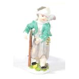 A Meissen Porcelain Figure of Cupid in Disguise, circa 1755, as a wounded figure wearing a head