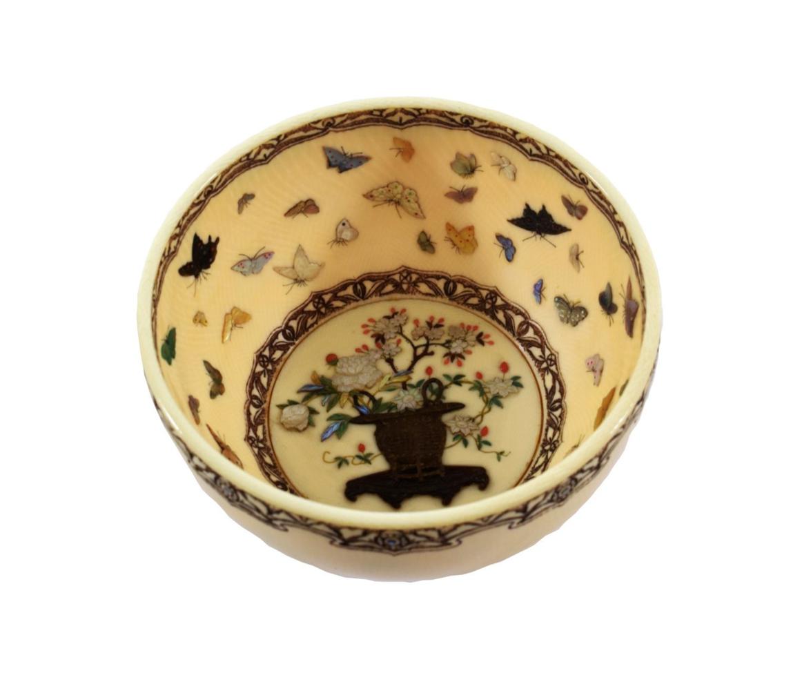A Japanese Ivory and Shibayama Bowl, Meiji period, of circular form, inlaid with a vase of flowers