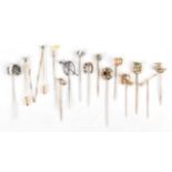 Fourteen Stick Pins, including a diamond set horn and crop, cased; other hunting related examples;