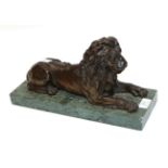 A Bronze Figure of a Recumbent Lion, 19th century, naturalistically modelled on a verde antico base,