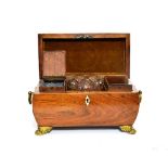 A Regency Gilt Metal Mounted Rosewood Tea Caddy and Hinged Cover, of sarcophagus form with ring