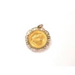 A 1914 sovereign loose mounted as a pendant . 9 carat gold mount. Gross weight 10.55 grams.