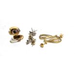 A pair of 18 carat white gold fish motif stud earrings; three pairs of 9 carat white gold stud
