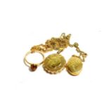 A 9 carat gold circular locket on a 9 carat gold chain; a 9 carat gold oval locket on a chain,