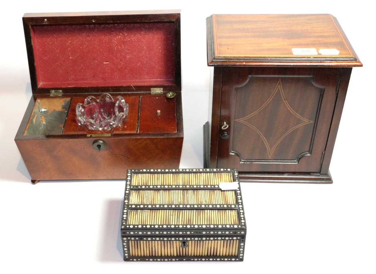 19th century tea caddy with mixing bowl; a small mahogany cabinet; a small cupboard; and a porcupine