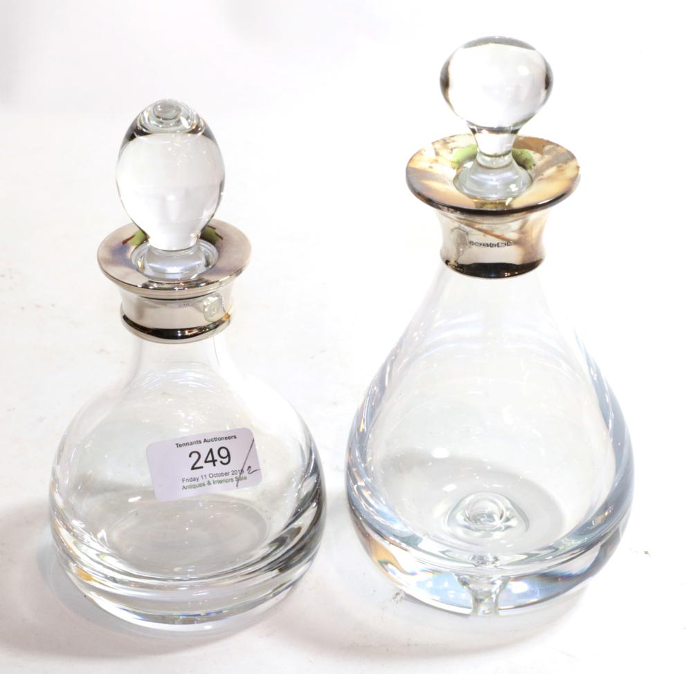 Two similar Elizabeth II silver-mounted decanters, the mounts by L. J. Millington, Birmingham,