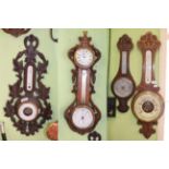 A combined timepiece/aneroid wall barometer and three other aneroid barometers (4)