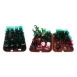 ^ A collection of Victorian green and cranberry glass including: ewers, wines, jugs and salts (three