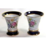 A pair of hand-painted Royal Dux Vases