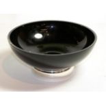 An Elizabeth II silver-mounted black glass bowl, the mounts by Broadway and Co., Birmingham, 2006,