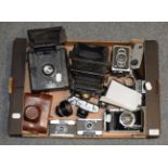 Thirteen photographic items including Ensign 820 with Ross Xpress lens; two 1930s box cameras; two