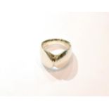 A contemporary silver ring by George Jensen, of plain polished form, numbered 100, finger size L1/2.