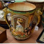 A Royal Doulton Queen Elizabeth II loving cup 76/250, with certificate of authenticity (2)