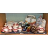 Shelf of ceramics including tea wares, Staffordshire spill vase and spaniel, Carlton ware cabinet