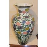 A 19th century Japanese porcelain vase decorated with stylised flowers