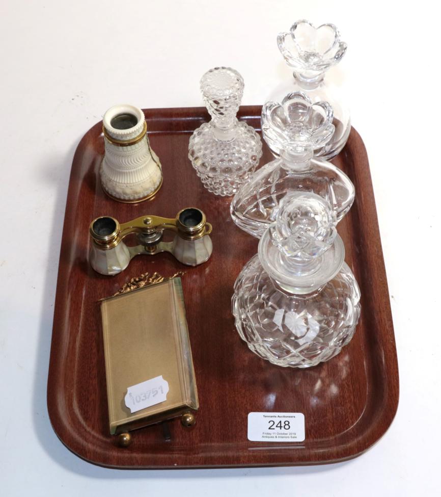 Four glass scent bottles, gilt metal picture frame, mother of pearl opera glasses, and an ivory