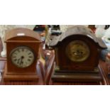 An Edwardian inlaid mahogany mantel clock; an oak mantel clock; an 8 day 'Volta gong' wall clock and