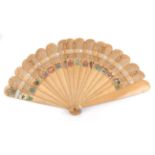 A Circa 1870's Wood Brisé Fan, the guards varnished, the sixteen inner sticks decoratively pierced