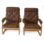 A Pair of Danish Design Beech and Bentwood Lounge Chairs, upholstered in buttoned brown leather,