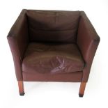 A Danish Design Lounge Chair, in the manner of Borge Mogensen, covered in dark brown leather, with