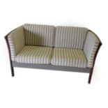 Stouby: A Danish Stained Beech Two-Seater Sofa, covered in striped cream fabric and grey cloth