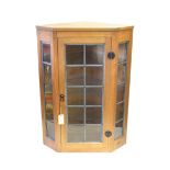 Mouseman: A Robert Thompson of Kilburn Glazed English Oak Hanging Corner Cupboard, the leaded glazed
