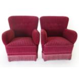 A Pair of Danish Design Art Deco Style Club Armchairs, upholstered in red striped buttoned fabric