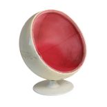 Eero Aarnio (Finnish, b.1932): A Ball or Globe Chair, the cream fibreglass with removable pivoting