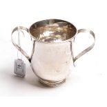A George III silver two-handled cup, by James Young, London, 1783, baluster and on spreading foot,