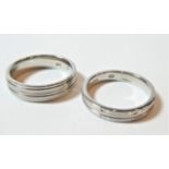 Two palladium band rings, finger sizes S1/2 and V. Gross weight 13.05 grams.