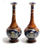 A pair of Royal Doulton stoneware vases