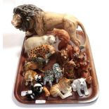 A collection of wild animals including Melba Ware lion and various other animal models