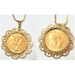 A 1926 sovereign loose mounted as a pendant on a 9 carat gold chain, pendant length 4cm, chain