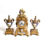 A 19th century French gilt-metal and porcelain clock garniture (3)