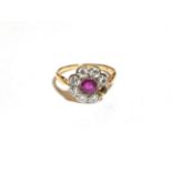 A ruby and diamond cluster ring, finger size M1/2 One stone loose but present . Unmarked. Gross