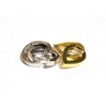 A pair of 18 carat gold pointed earrings; and a pair of 9 carat white gold cuff earrings (2). 18