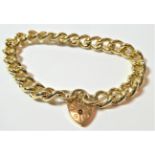A 9 carat gold curb and lock bracelet, length 21.5cm . Gross weight 39 grams.