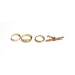 Two 9 carat gold band rings, finger sizes J and M1/2; another 9 carat gold ring, finger size P;