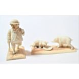 An Austrian ivory anthropomorphic figure of a pup, circa 1900, walking on its hind legs wearing a