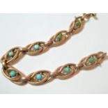 A turquoise fancy link bracelet, length 20cm (a.f.). Applied plaque stamped '9CT'. Turquoise