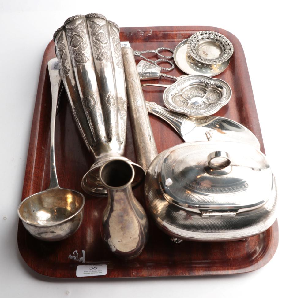 A tray of silver and metalware, including: a German or Austrian silver soup-ladle, maker's mark I