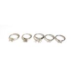 Five platinum solitaire vacant ring mounts, varying sizes (5). Gross weight 24.25 grams.
