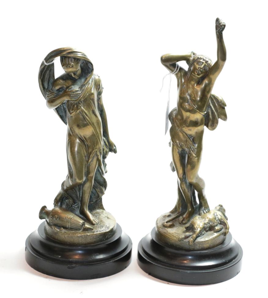 A pair of Victorian cast brass figures