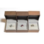 A 9 carat gold aquamarine and diamond ring, finger size P1/2; an aquamarine and diamond ring,