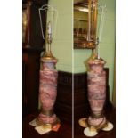 A pair of pink marble lamps