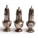 Three various sugar casters, comprising: two octagonal examples, each with pull-off cover, one by