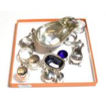 Assorted silver, including: an Edward VIII silver sauce-boat, Sheffield, 1936; four napkin-kings;